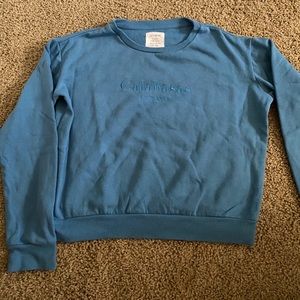 Blue crew neck sweater